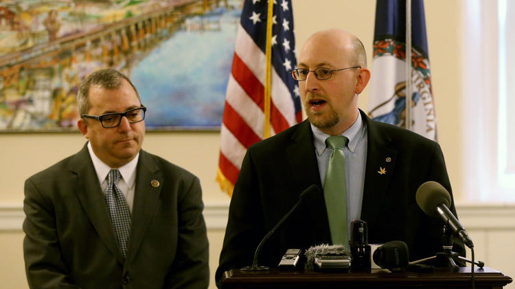 Sen. Adam P. Ebbin, D-Alexandria, left, and Ed McCann, policy director for Viriginia NORML (National Organization for the Reform of Marjuana Laws, address a press conference at the state Capitol in Richmond, Va. (Bob Brown / Associated Press)