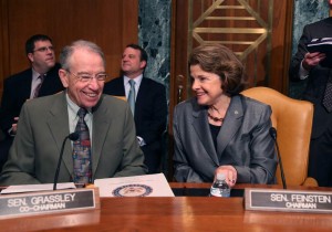 U.S. Sen. Dianne Feinstein (D-CA) (R) and U.S. Sen. Chuck Grassley (R-IA) talk during Senate Caucus on International Narcotics Control hearing on Capitol Hill (Photo by Mark Wilson/Getty Images)